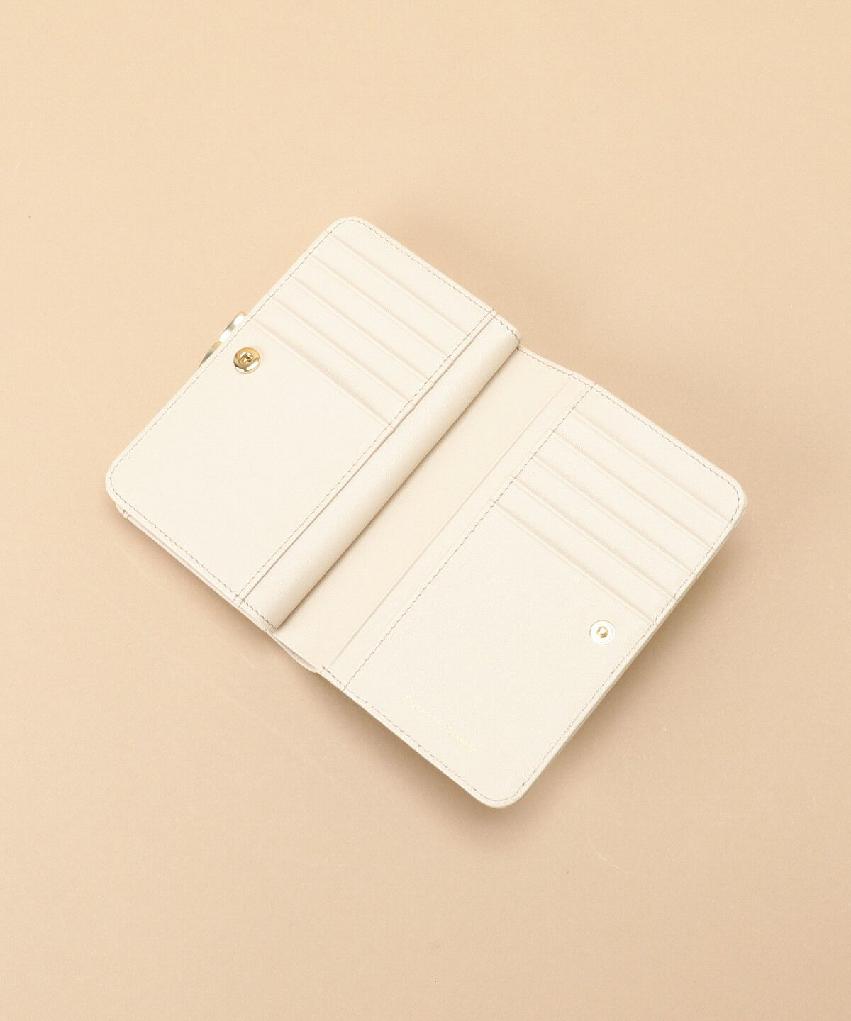 Samantha Thavasa「Pomme d'espoir ポムディスポワール 型押し口金折財布」|財布|