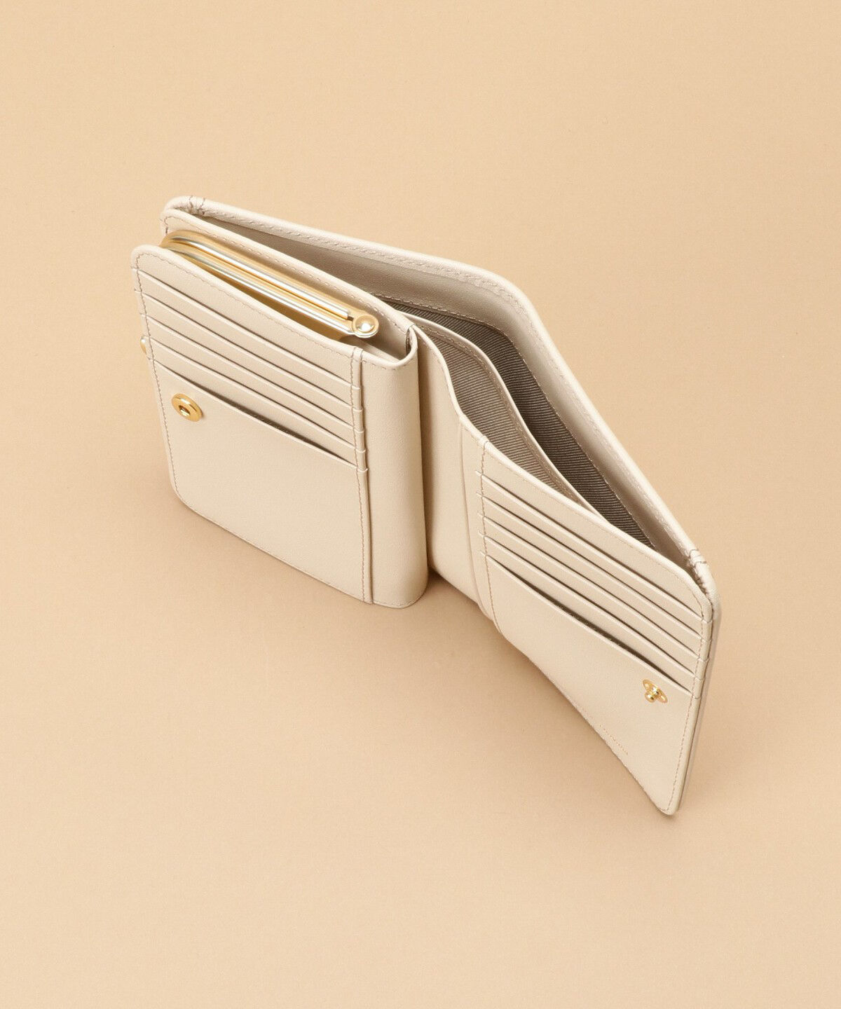 Samantha Thavasa「Pomme d'espoir ポムディスポワール 型押し口金折財布」|財布|