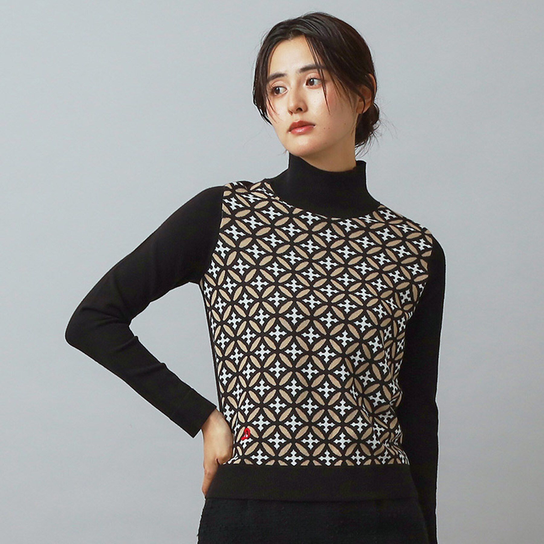 DRESSTERIOR「オーバーラップサークルタートルネック」|ニット・セーター|