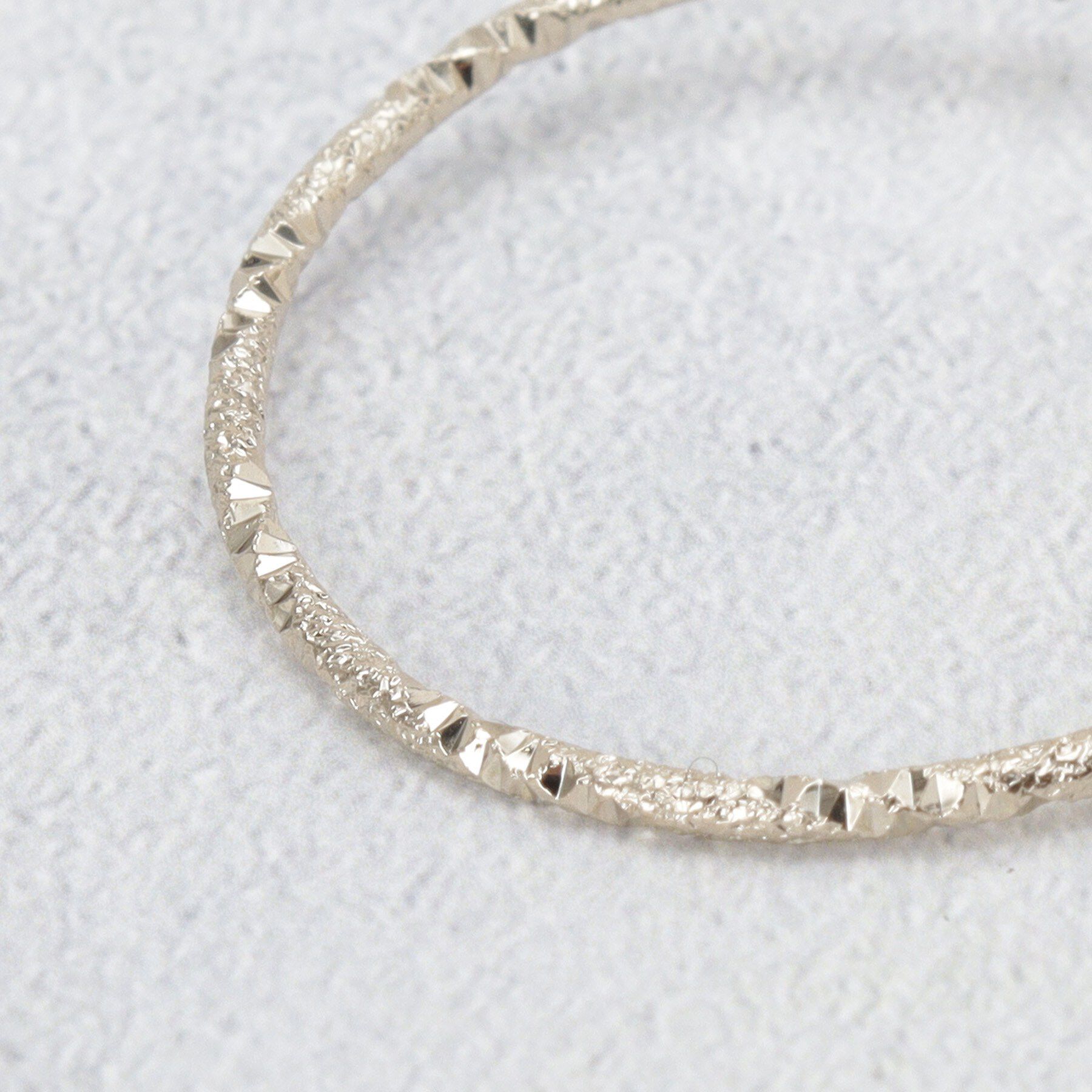 OPAQUE.CLIP「表面デザイン フープピアス」|ピアス|