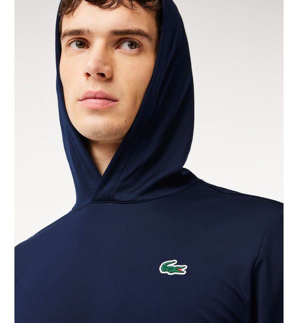 LACOSTE「ハイストレッチプルオーバーフーディー」|スポーツ|