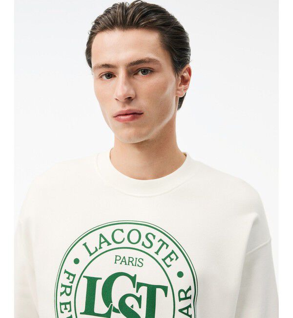 LACOSTE「オーバーサイズ LCSTサークルグラフィッククルーネックスウェット トレーナー」|スウェット・ジャージ|