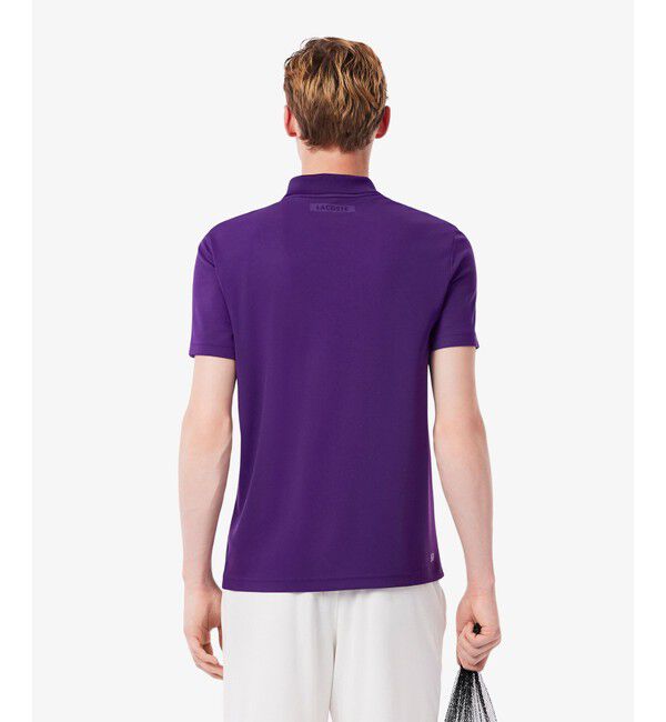 LACOSTE「アシンメトリーラケットグラフィックウルトラドライポロシャツ」|ポロシャツ|