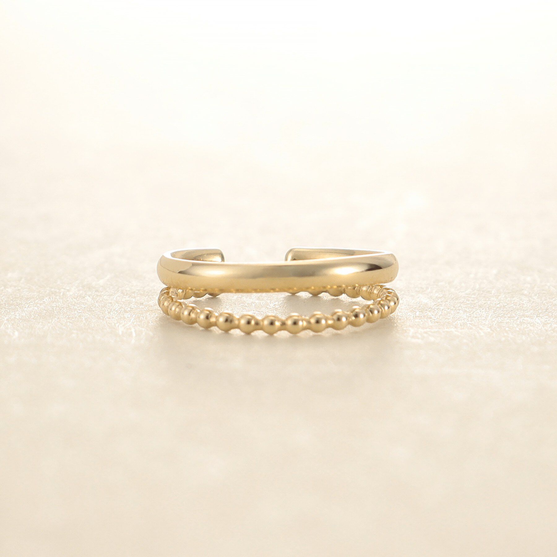 COCOSHNIK ONKITSCH「K10ボールレイヤードイヤーカフ」|イヤリング|