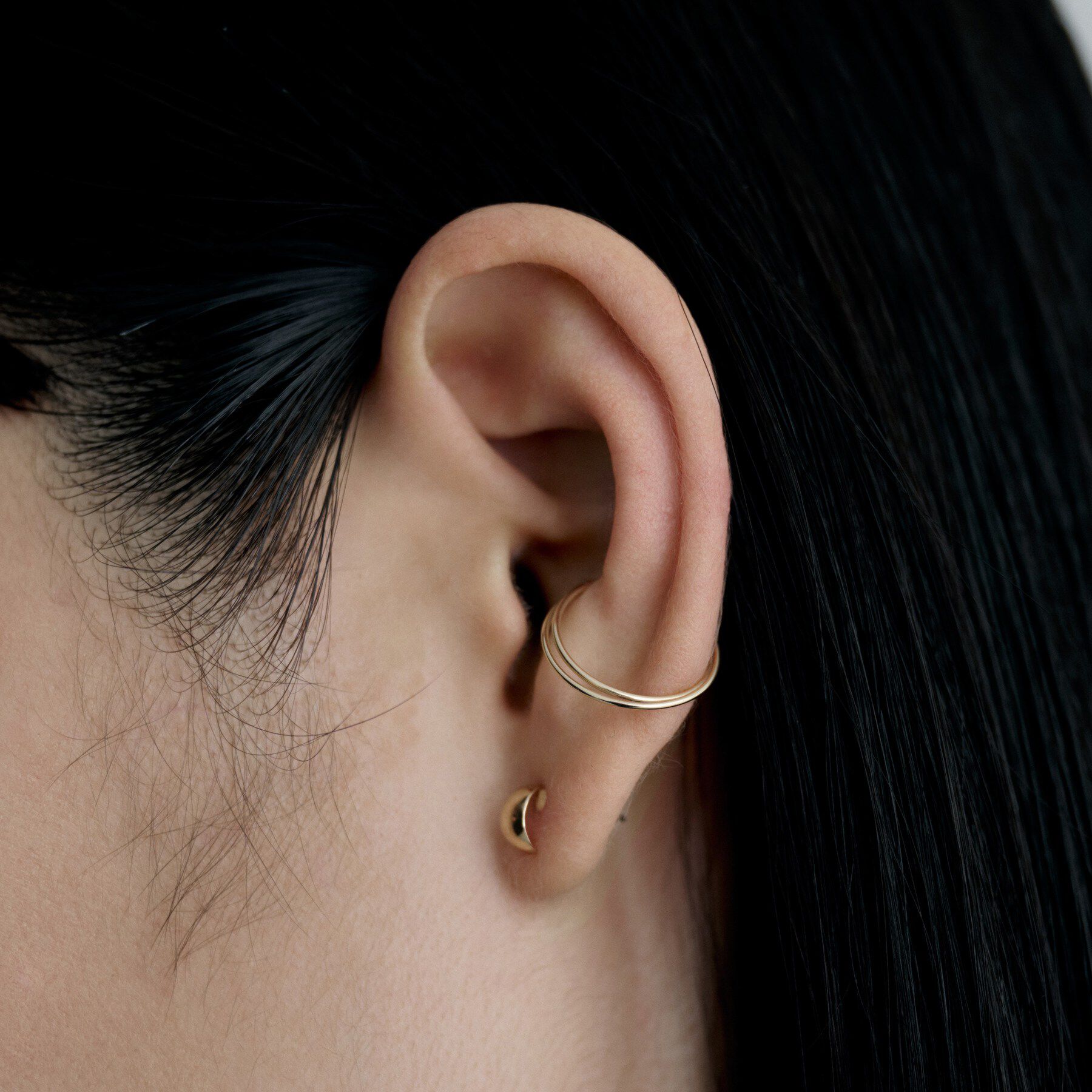 COCOSHNIK ONKITSCH「K10クロスイヤーカフ」|イヤリング|