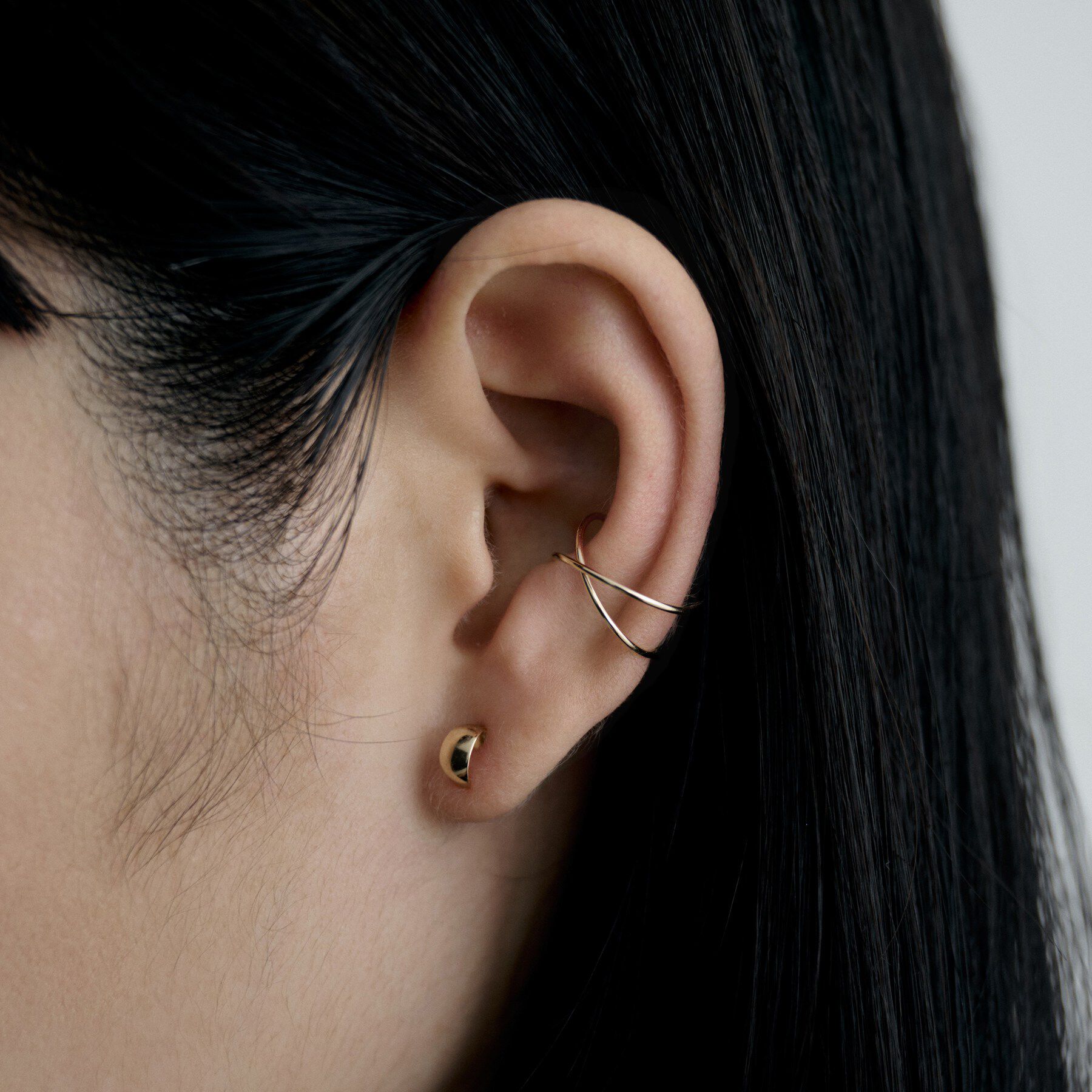 COCOSHNIK ONKITSCH「K10ワンストローククロスイヤーカフ」|イヤリング|