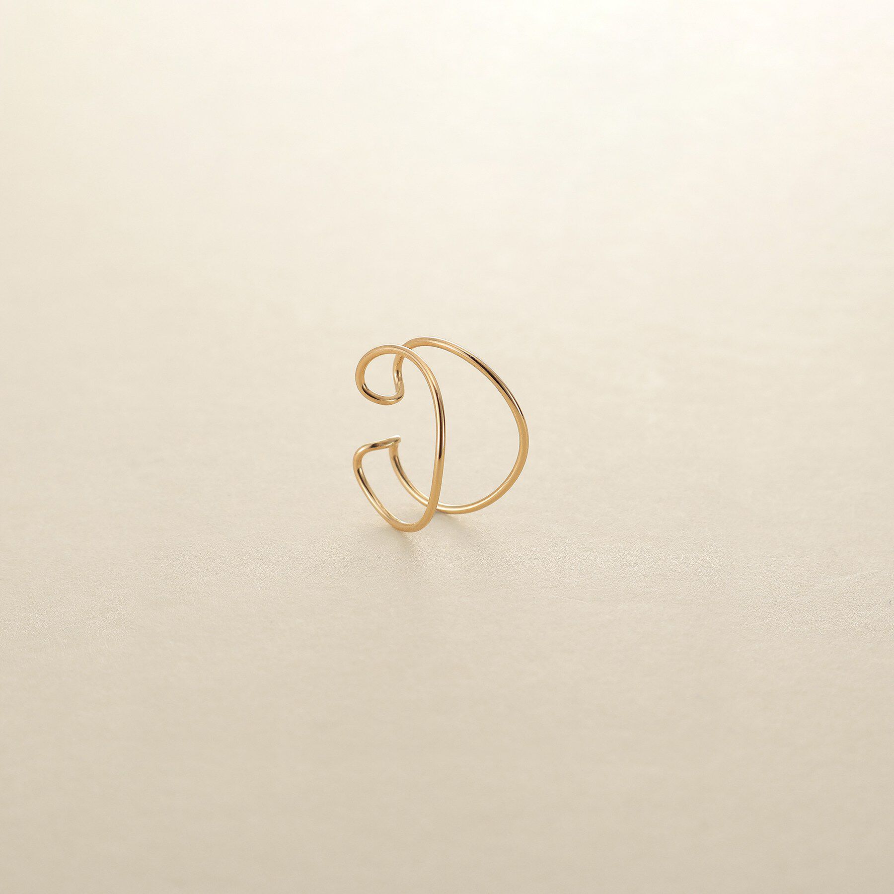 COCOSHNIK ONKITSCH「K10ワンストロークニュアンスイヤーカフ」|イヤリング|