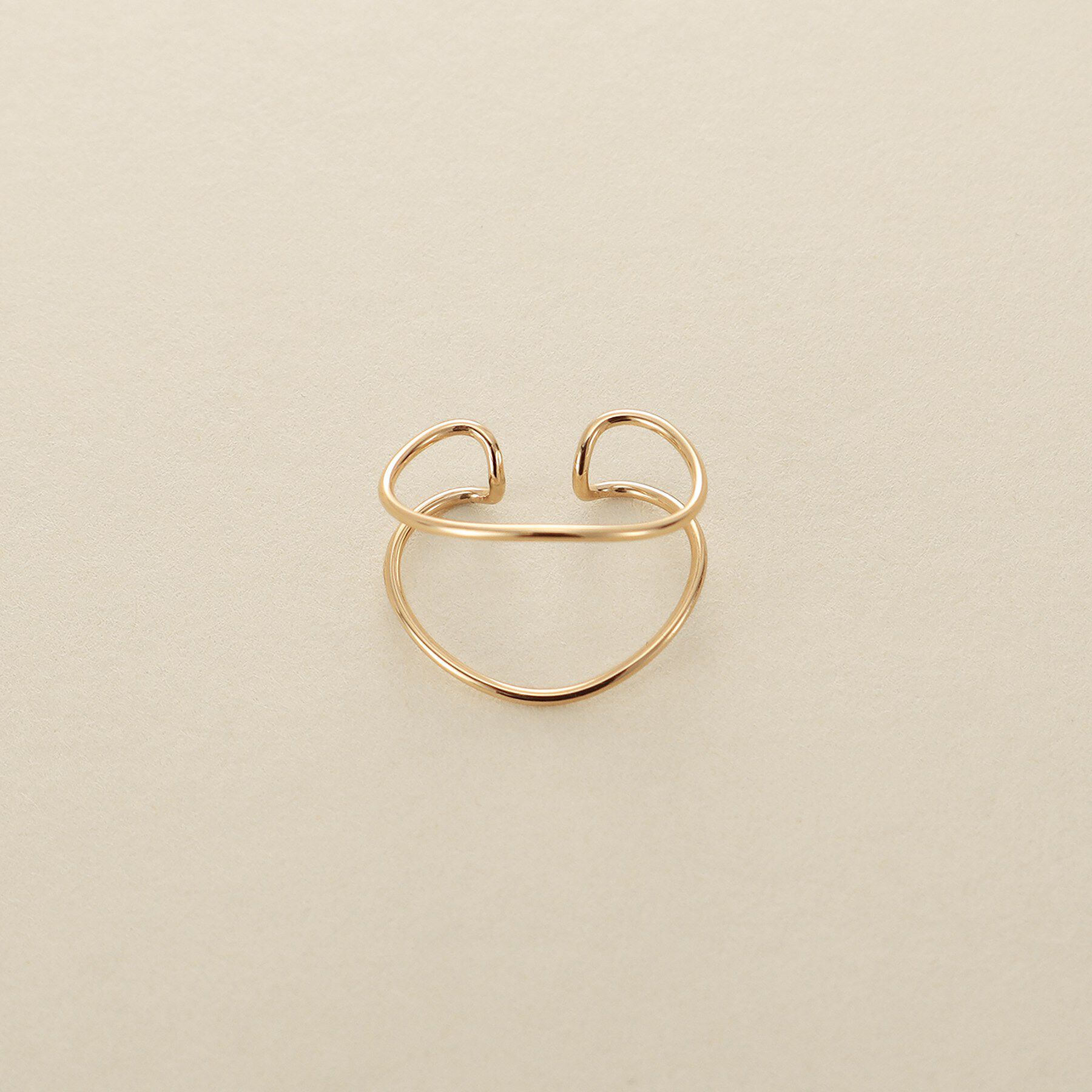 COCOSHNIK ONKITSCH「K10ワンストロークニュアンスイヤーカフ」|イヤリング|