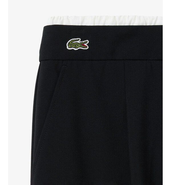 LACOSTE「レイヤードウエストタックワイドスラックスパンツ」|チノ|