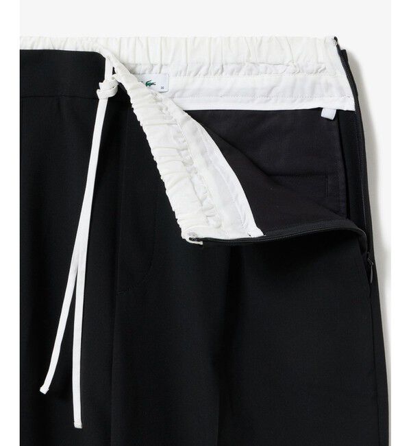 LACOSTE「レイヤードウエストタックワイドスラックスパンツ」|チノ|