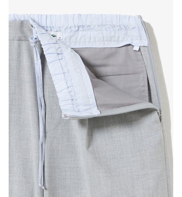 LACOSTE「レイヤードウエストタックワイドスラックスパンツ」|チノ|