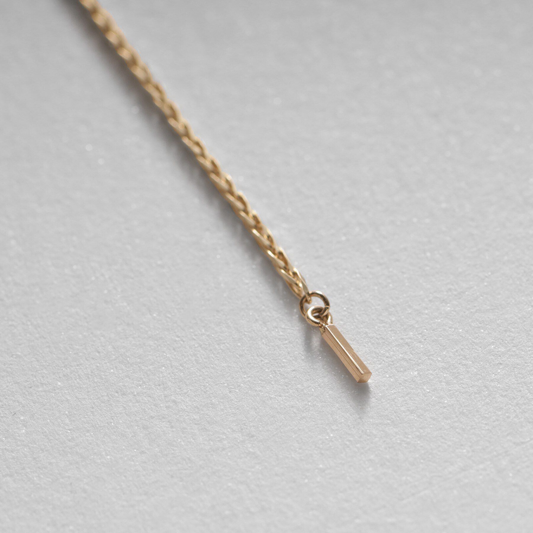 COCOSHNIK「K10スパイクトリプルターン スタッドピアス」|ピアス|