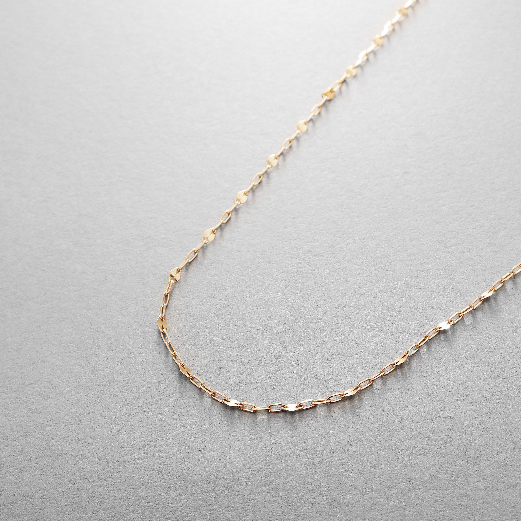 COCOSHNIK ONKITSCH「K10スキニーネックレス スキップペタル」|ネックレス|