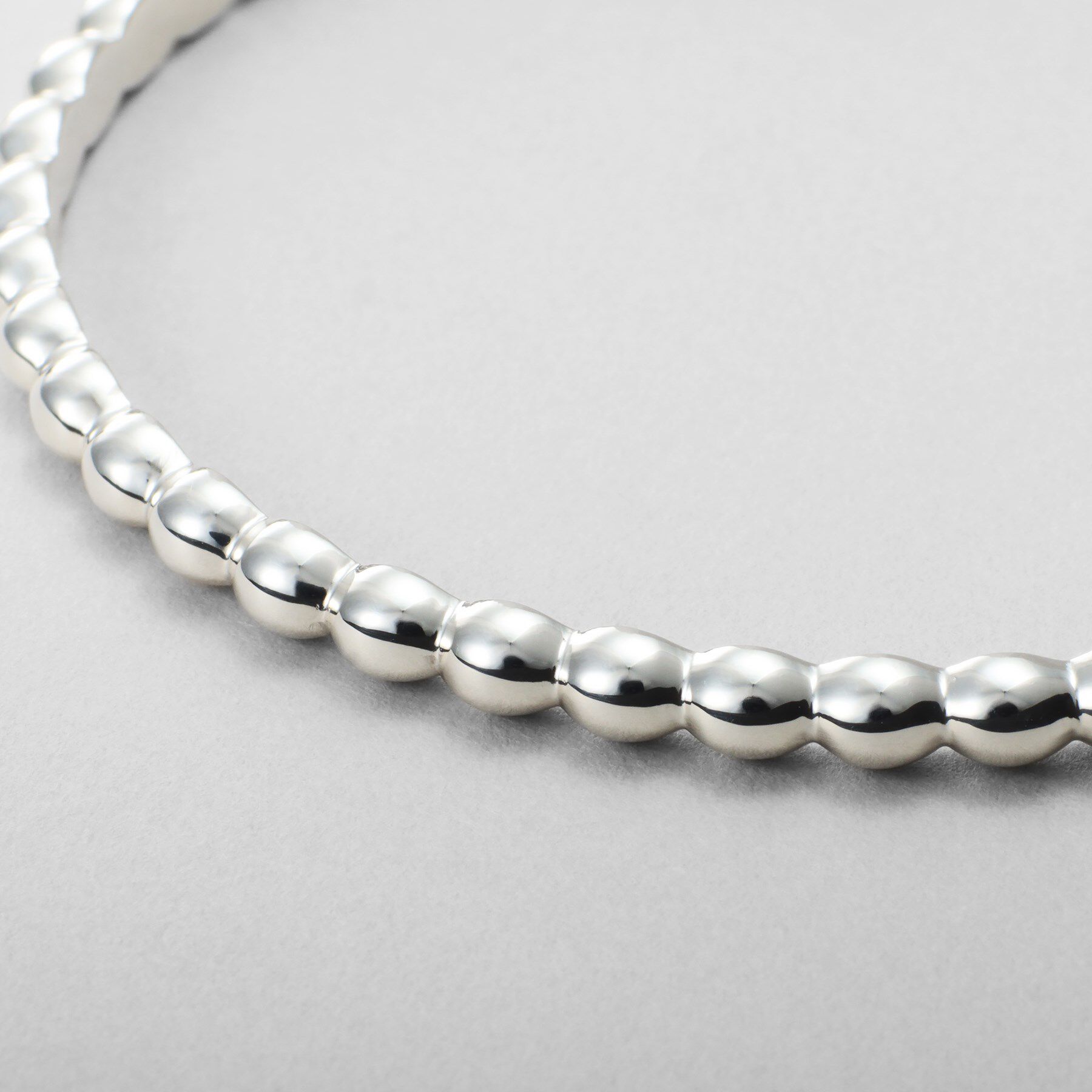 COCOSHNIK ONKITSCH「シルバー オーバルボールバングル」|ブレスレット・バングル|