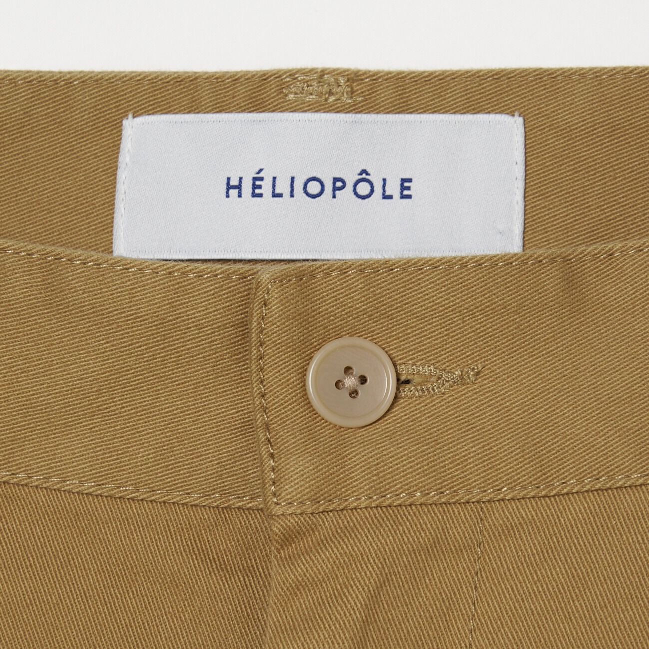 HELIOPOLE「HELIOPOLE COTTON TWILL CURVY TUCK PANTS」|チノ|
