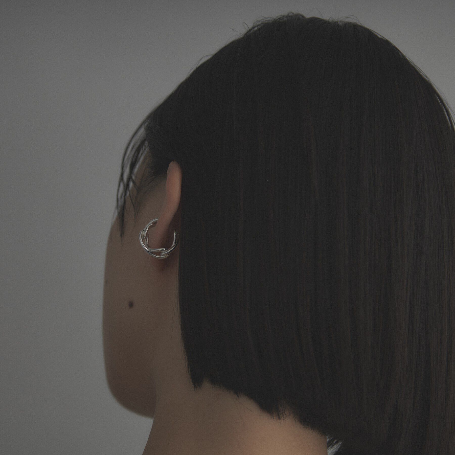 COCOSHNIK ONKITSCH「シルバー インフィニティイヤーカフ」|イヤリング|