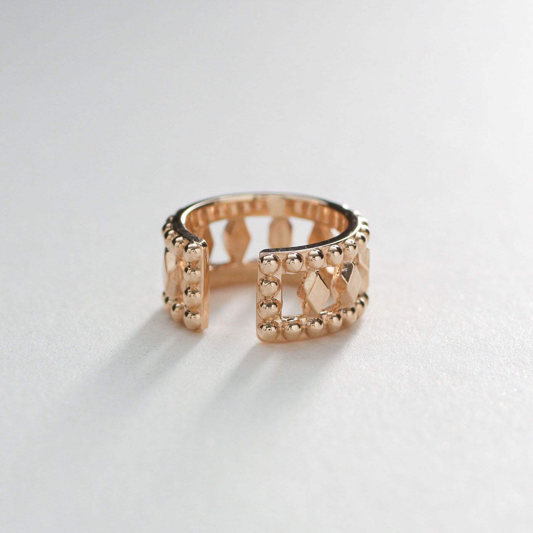 COCOSHNIK「K10切子&times;ミル イヤーカフ」|イヤリング|