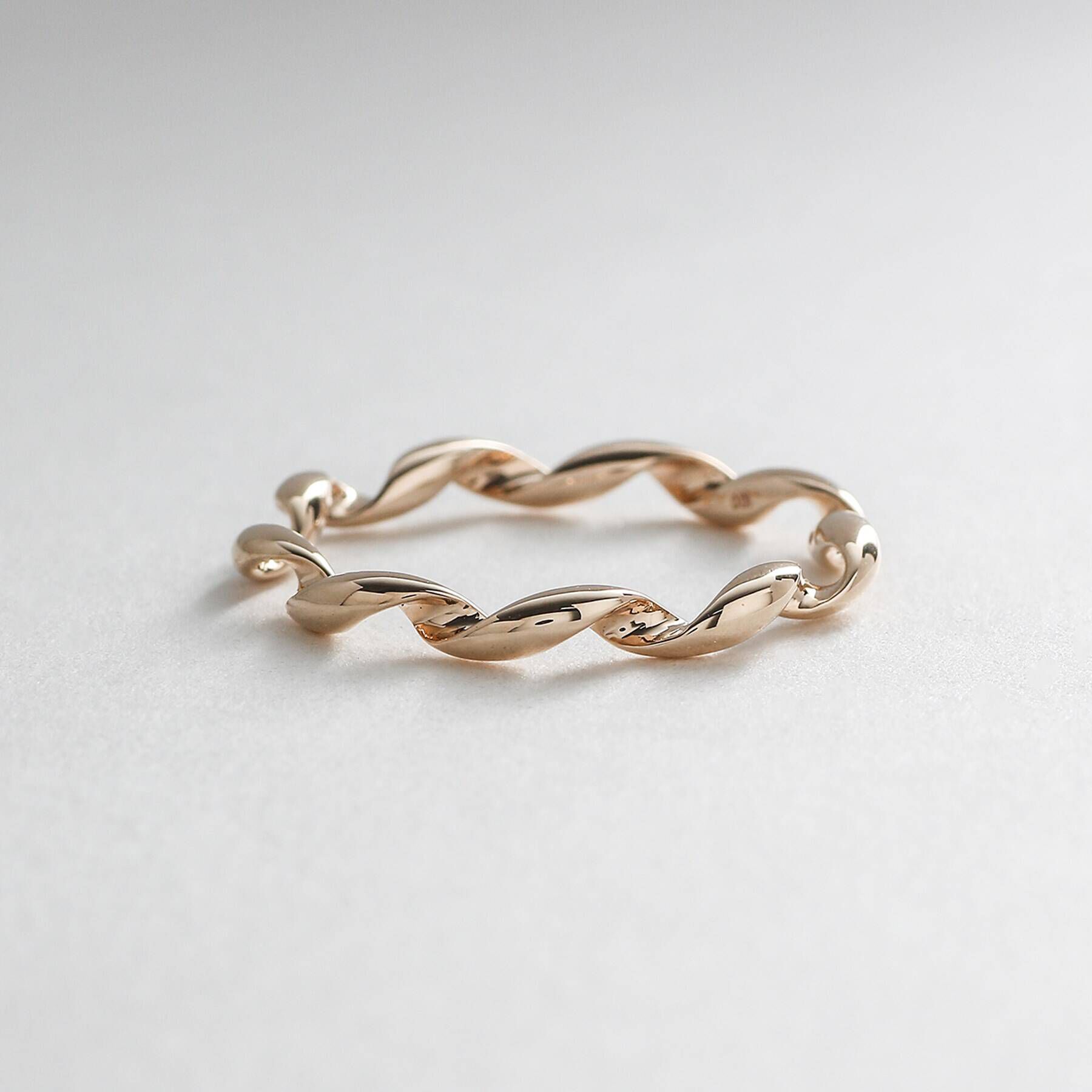 COCOSHNIK「K10甲丸ツイスト リング」|リング|