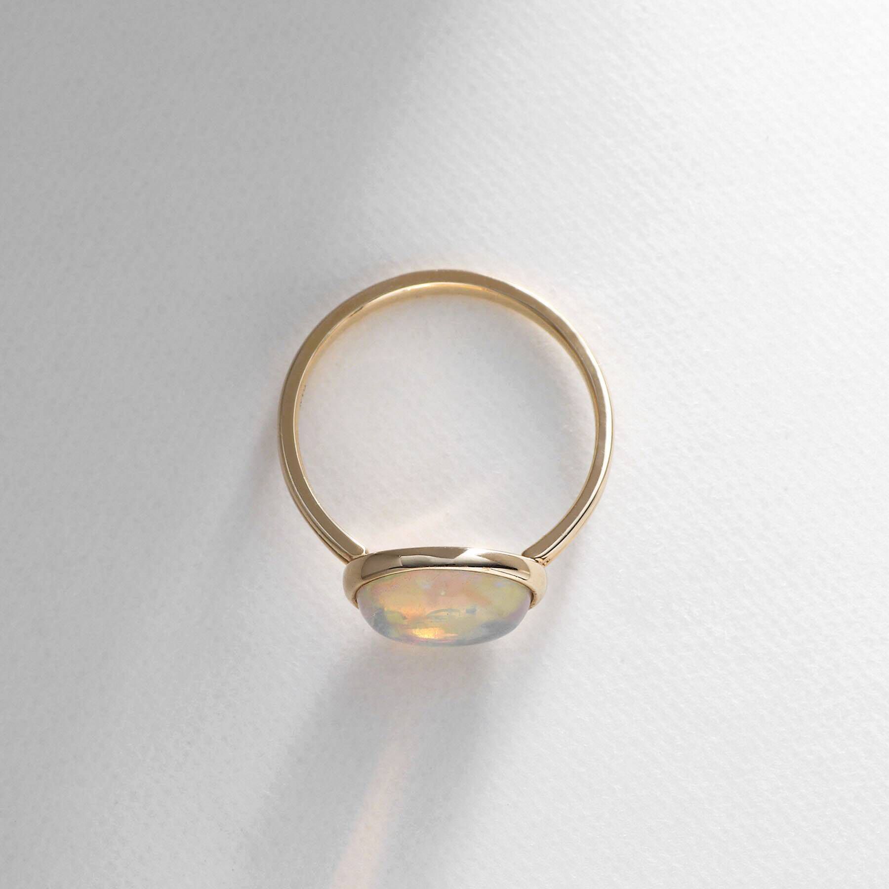 COCOSHNIK「K10エチオピアオパール オーバルカボション リング」|リング|