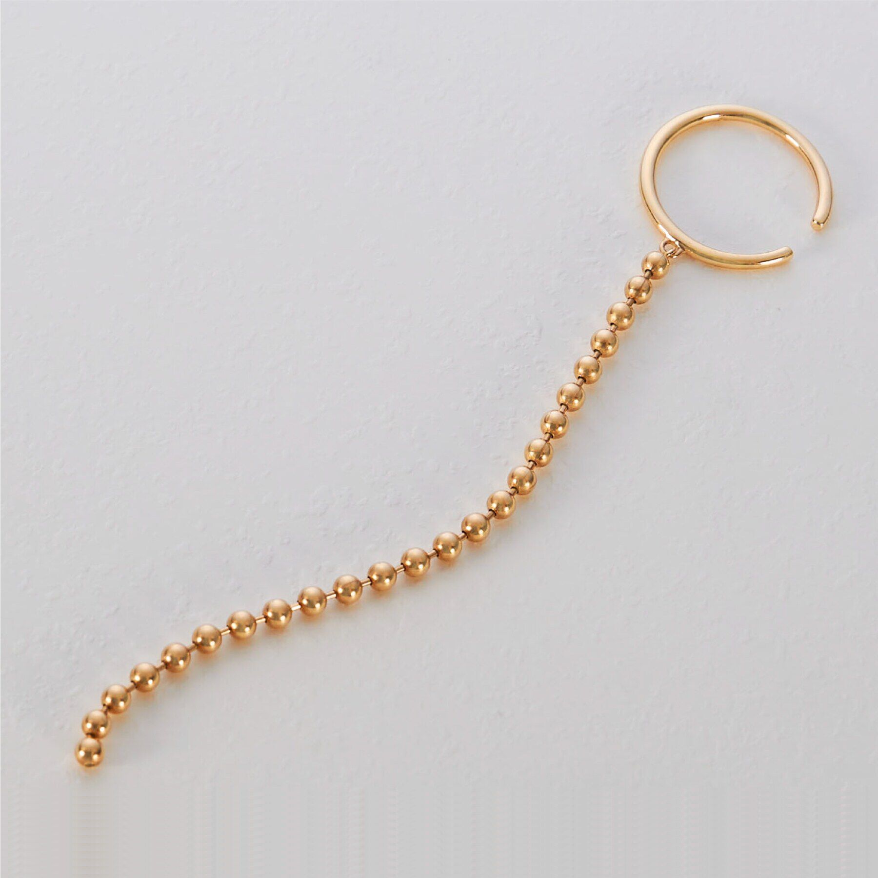 COCOSHNIK「K10ボールチェーン イヤーカフ」|イヤリング|