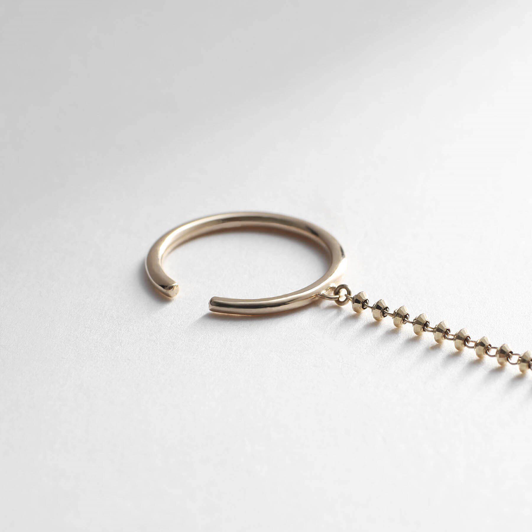 COCOSHNIK「K10カットビーズチェーン イヤーカフ」|イヤリング|