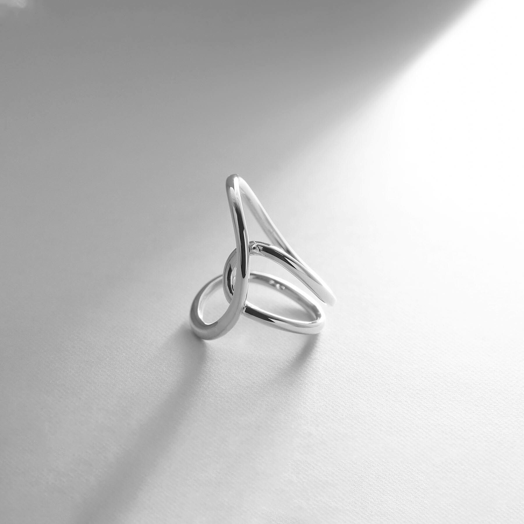 COCOSHNIK ONKITSCH「シルバー ニュアンスライン クロスフロートリング」|リング|