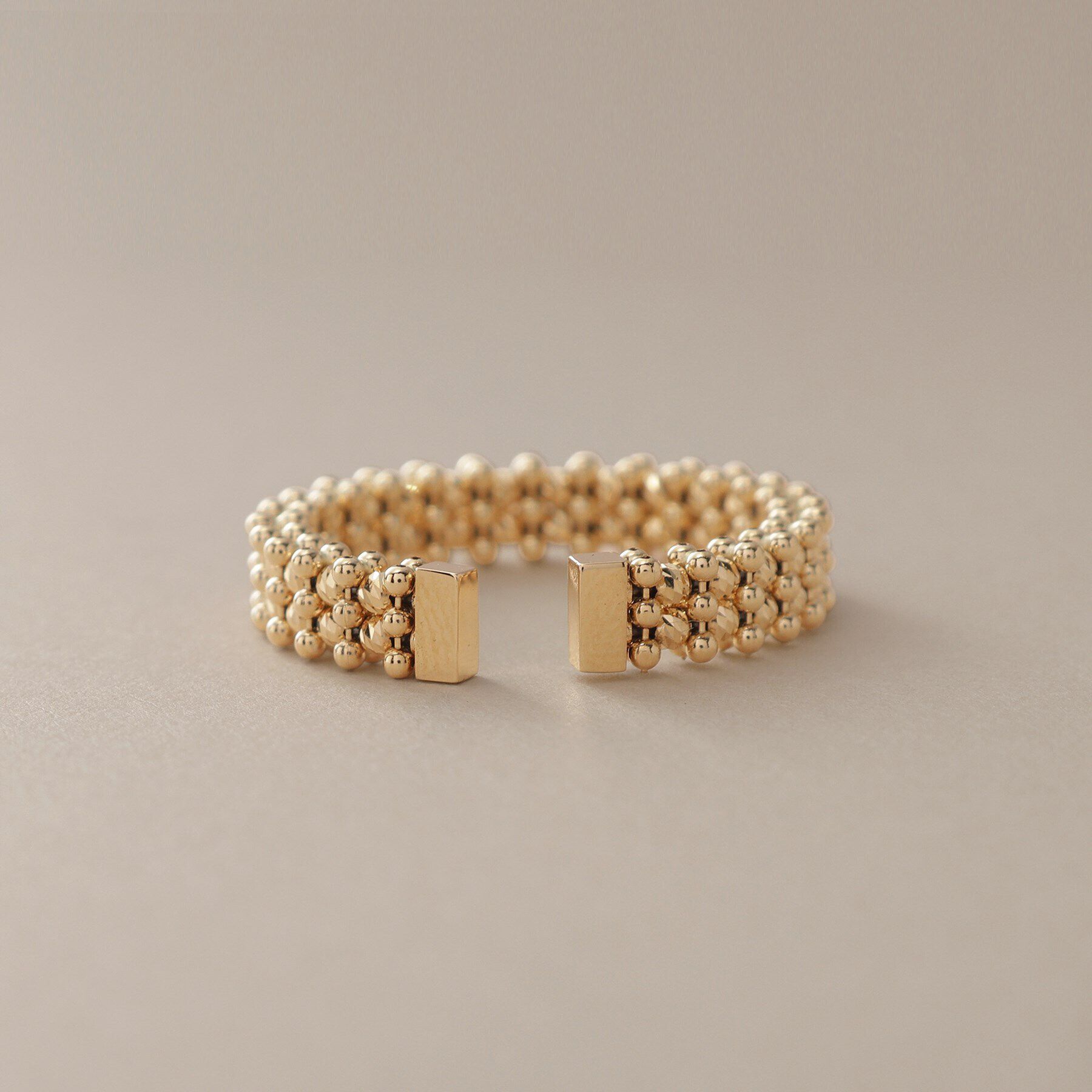 COCOSHNIK「K18ハニーカットボールオープン リング細」|リング|