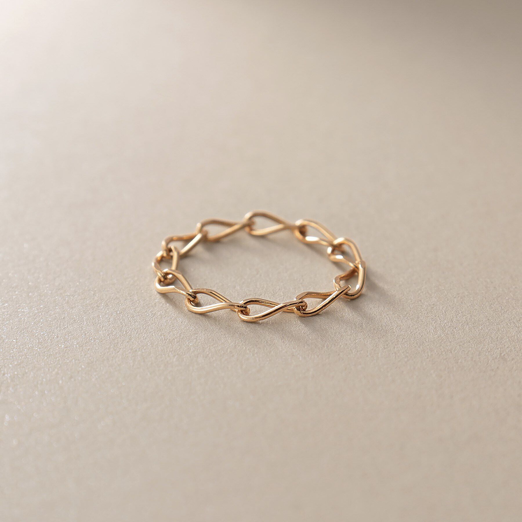 COCOSHNIK「K18ロングキヘイチェーン リング」|リング|