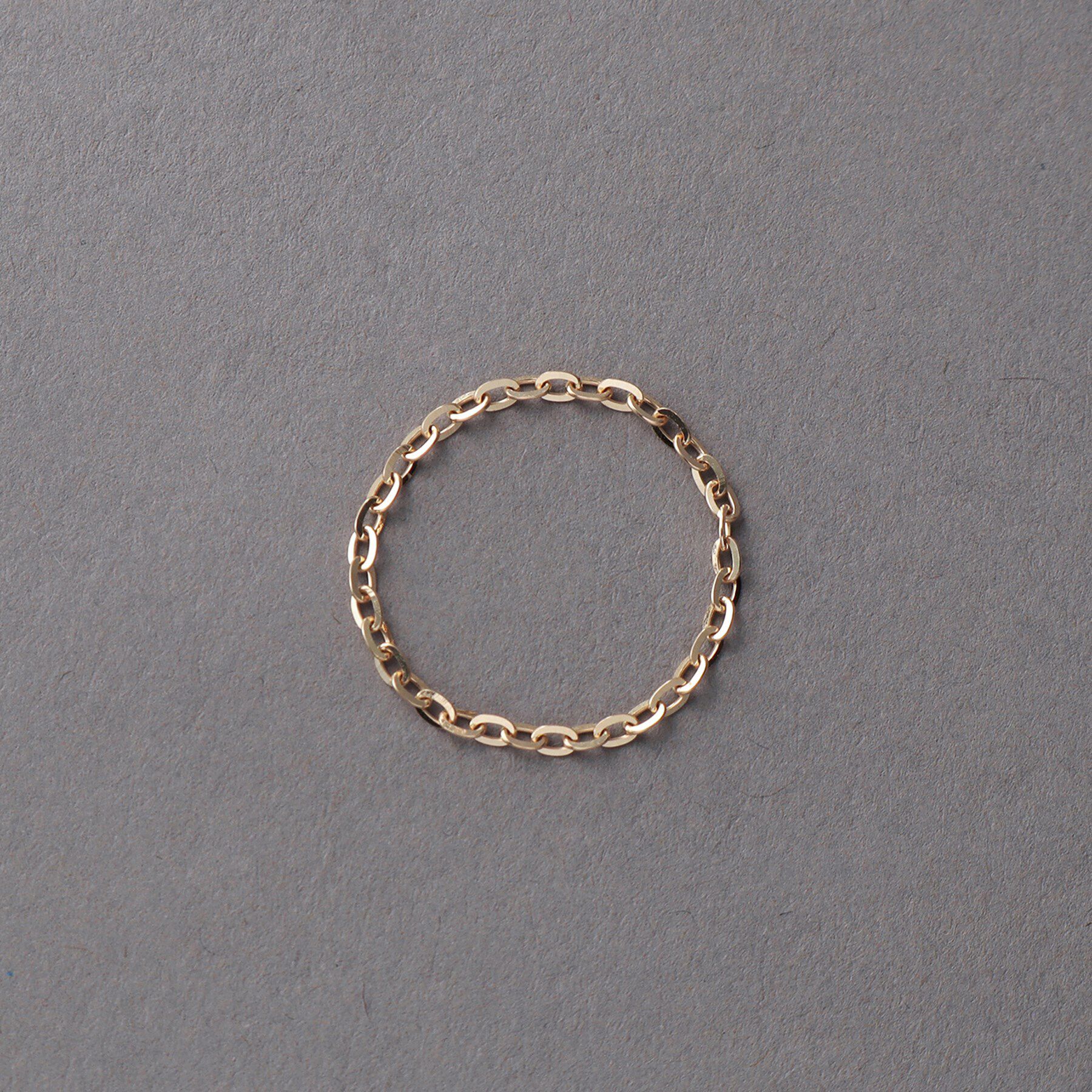 COCOSHNIK ONKITSCH「K10スキニーリング フラッシュケーブル」|リング|