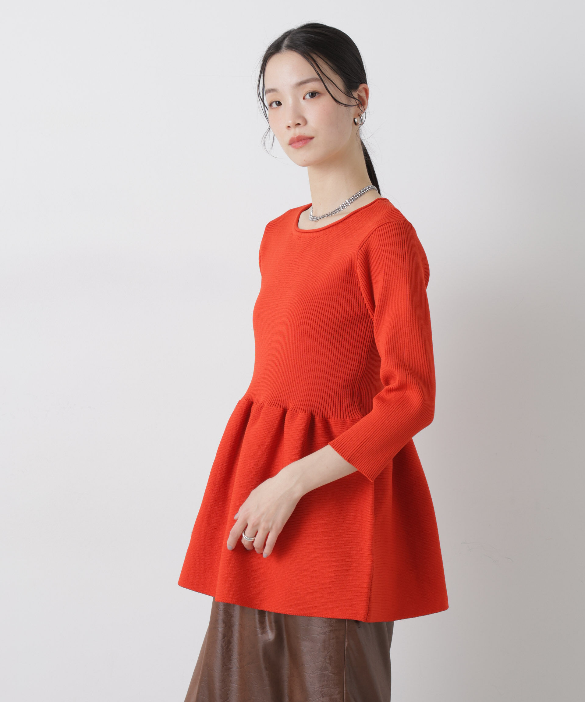 nano･universe「洗濯機洗い可スポンディッシュニットペプラムシルエットトップス」|ニット・セーター|