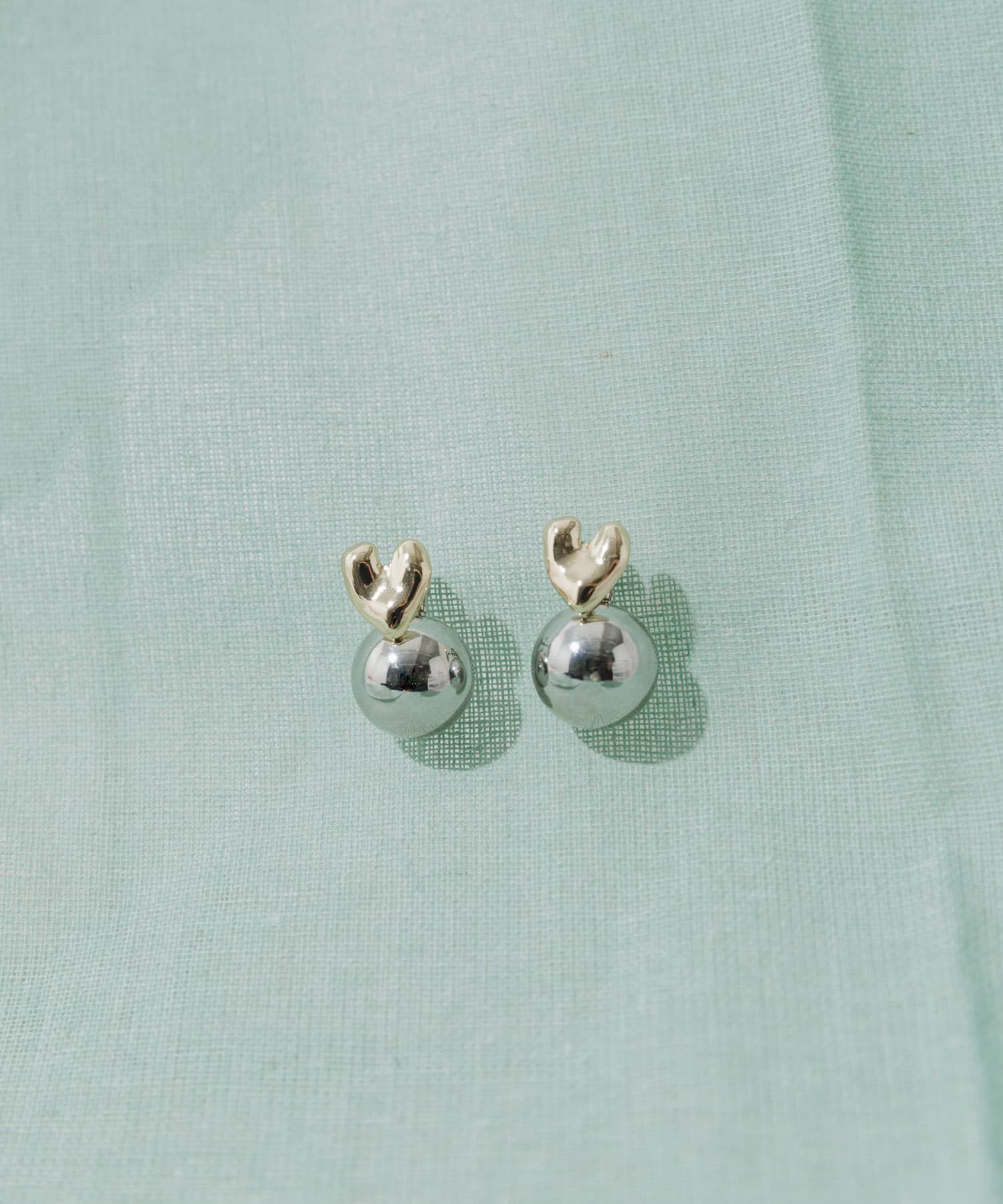 SMELLY「メタルハートコンビピアス」|ピアス|