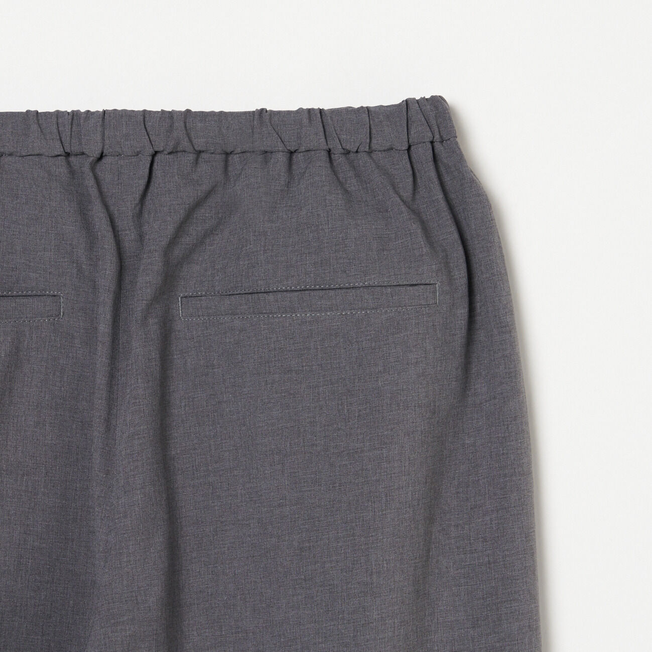 HELIOPOLE「HELIOPOLE BARREL LEG TUCK PANTS」|チノ|