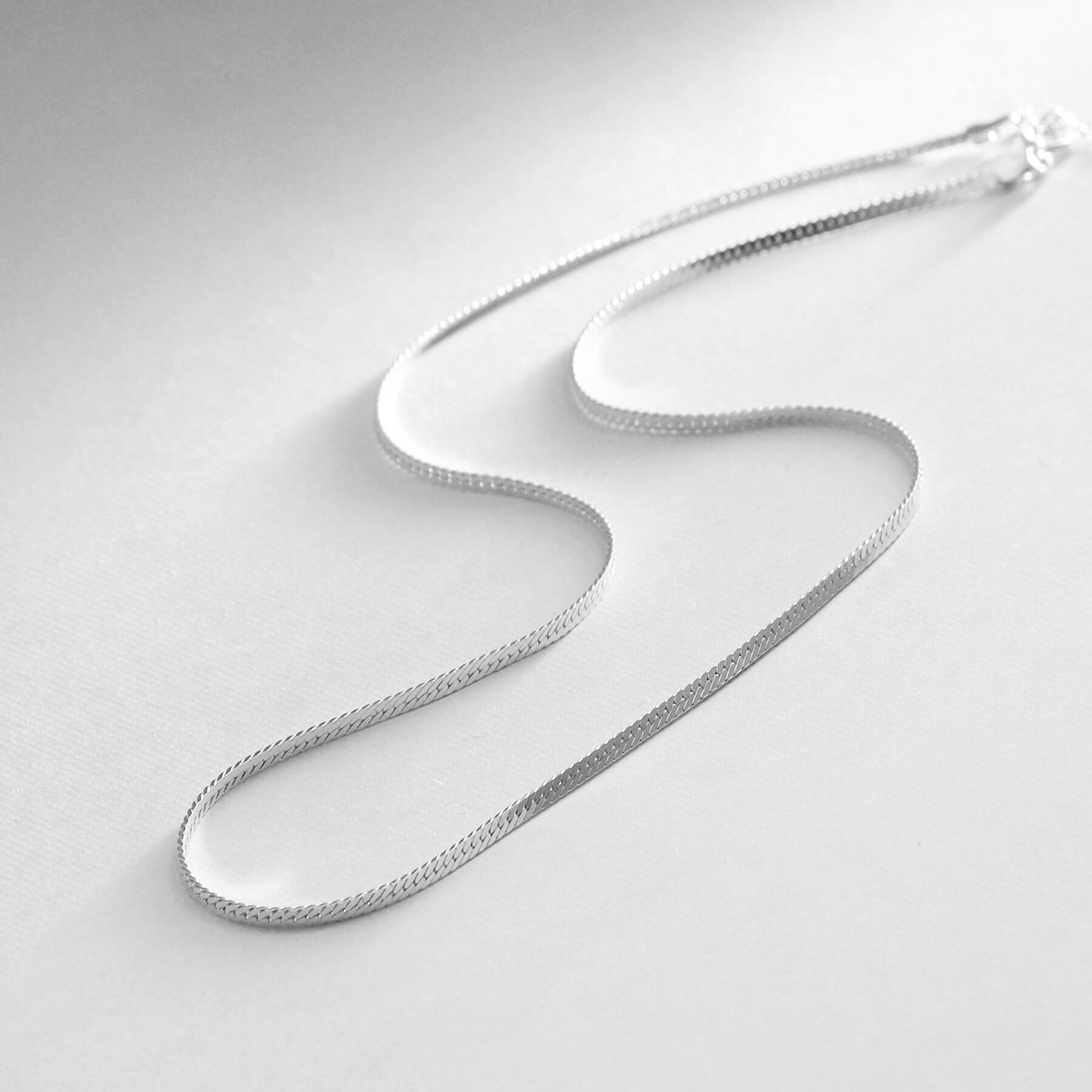 COCOSHNIK ONKITSCH「シルバー デザインチェーン フラットスネークネックレスS」|ネックレス|