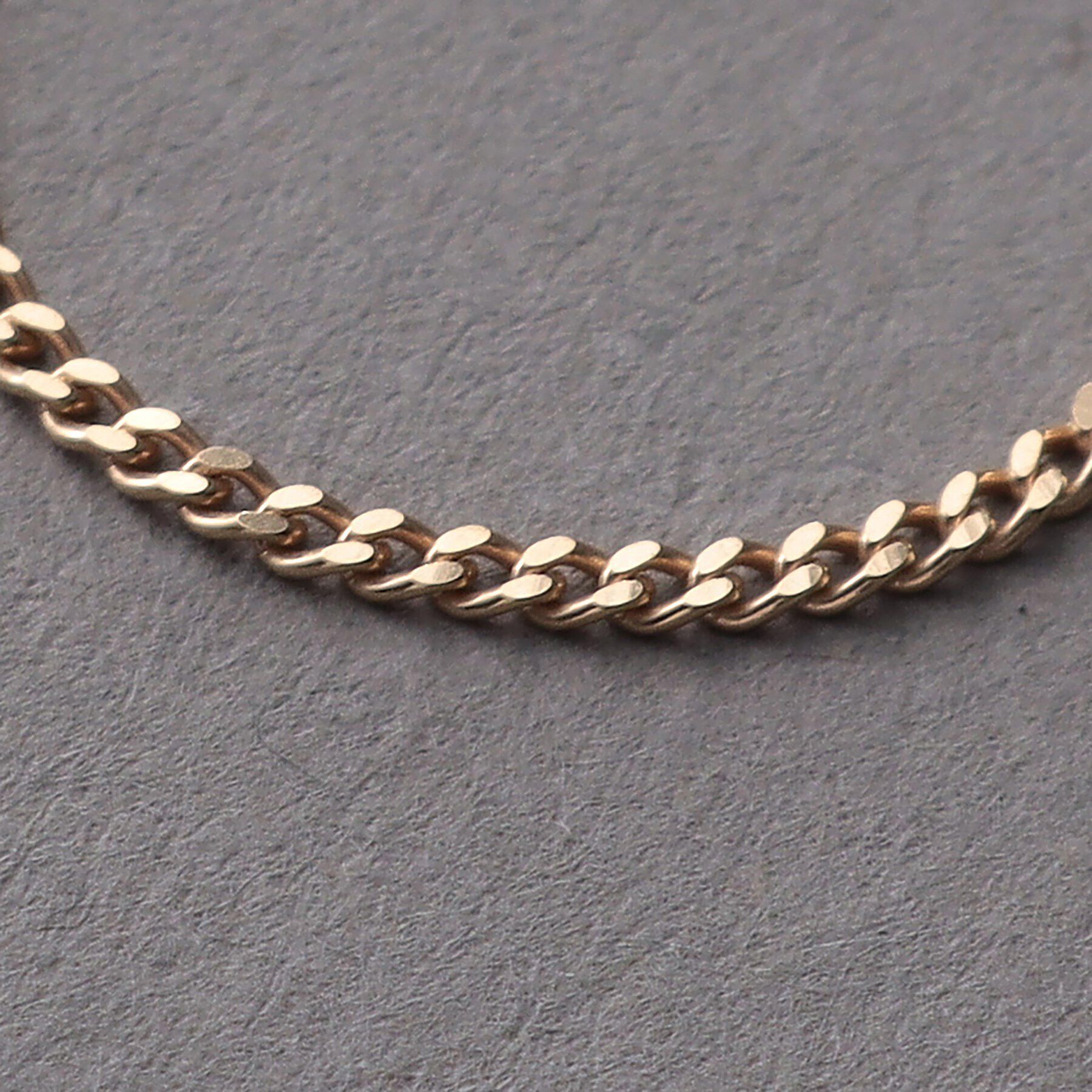 COCOSHNIK ONKITSCH「K10スキニーリング カーブチェーン」|リング|