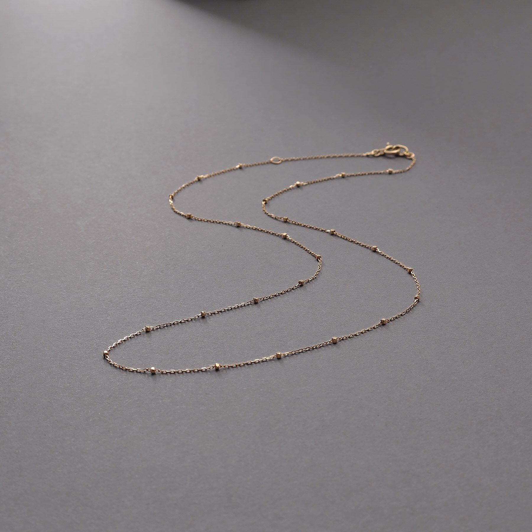 COCOSHNIK ONKITSCH「K10スキニーネックレス スタッドケーブル」|ネックレス|