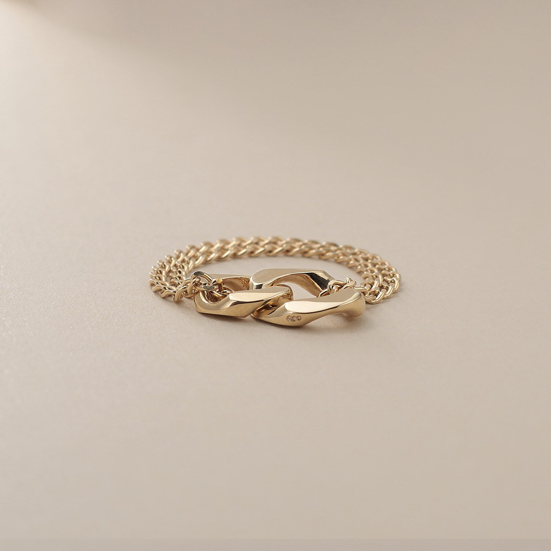 COCOSHNIK「K10キヘイモチーフダブルチェーン リング大」|リング|