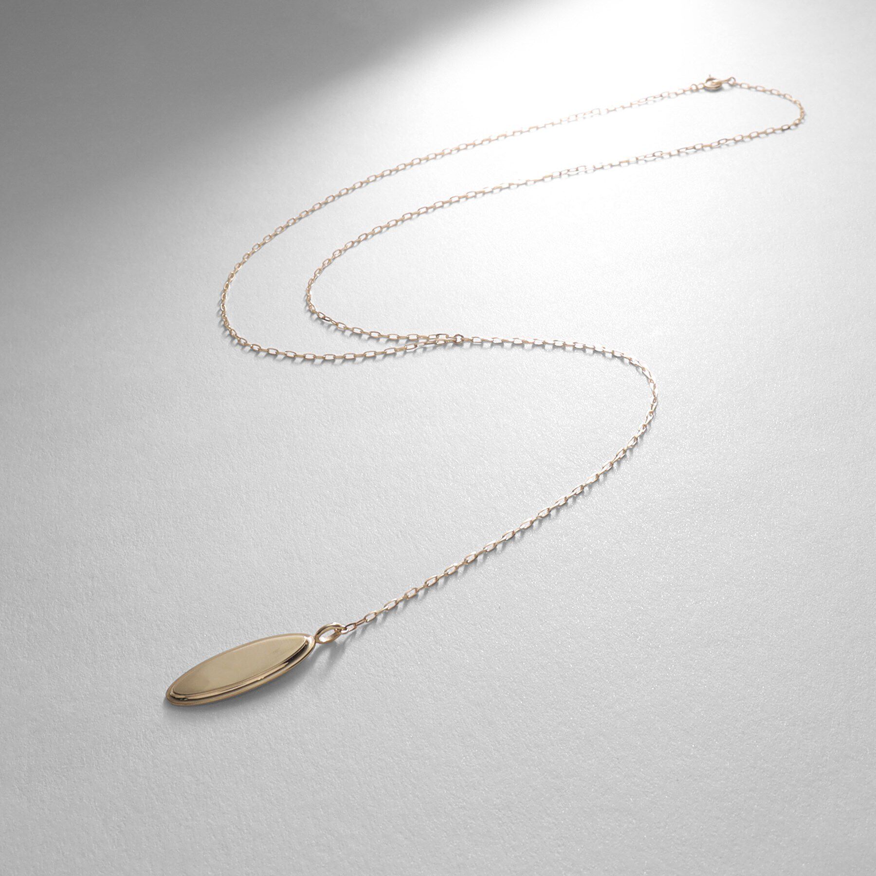 COCOSHNIK「K10ラップフレーム オーバルカットY字 ネックレス」|ネックレス|