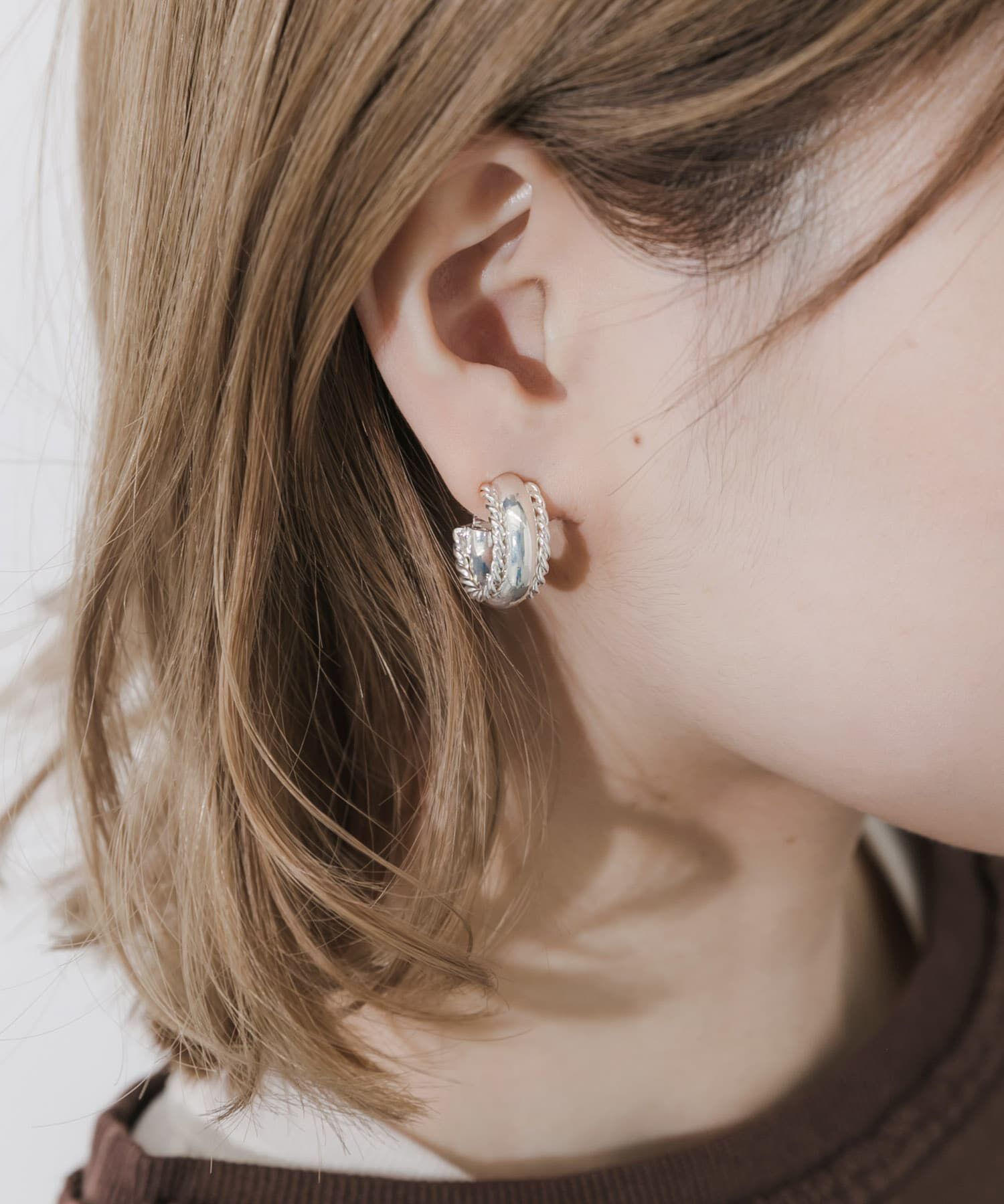 SMELLY「ツイストデザインフープイヤリング」|イヤリング|シルバー