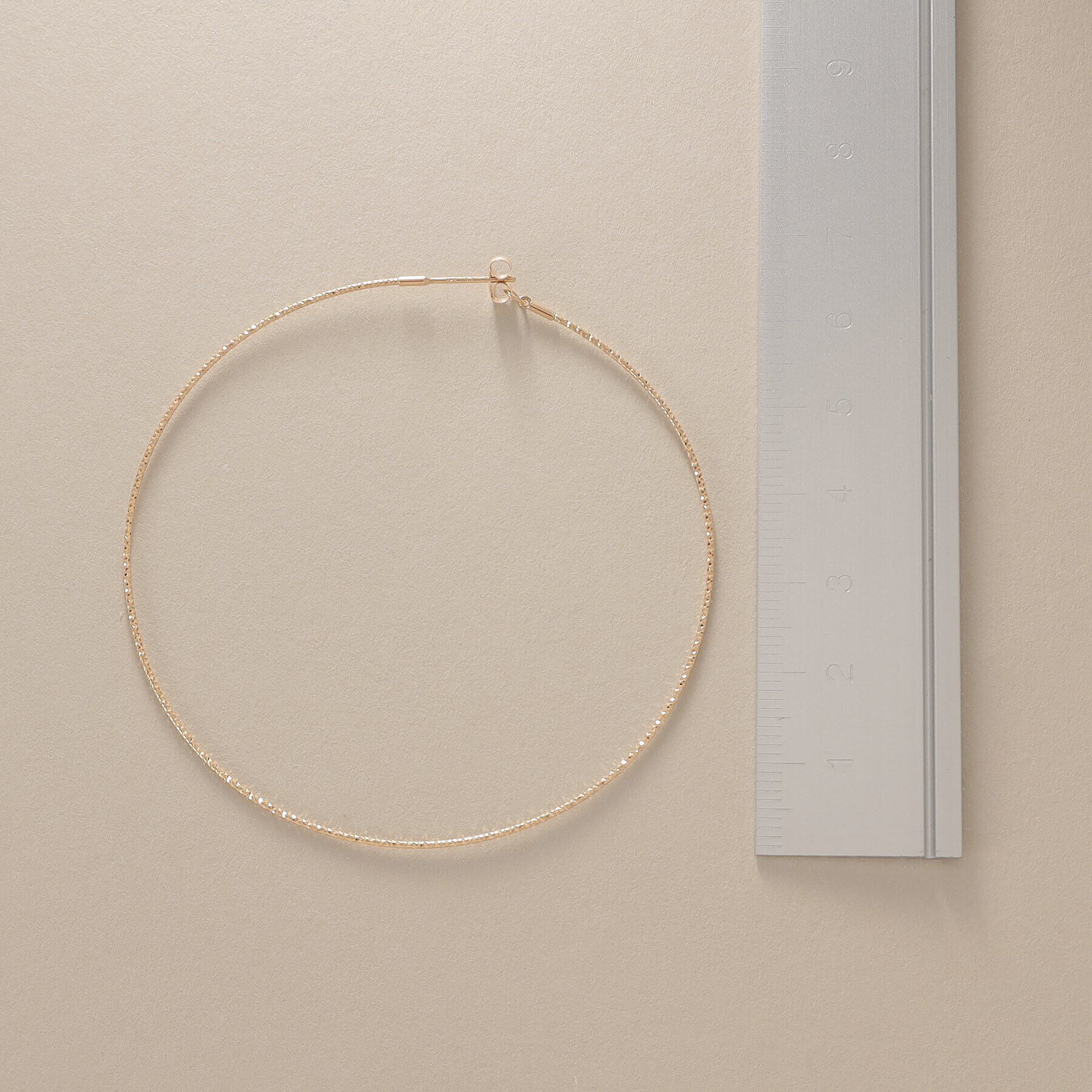 COCOSHNIK「K10カット丸線 フープピアス（大）」|ピアス|