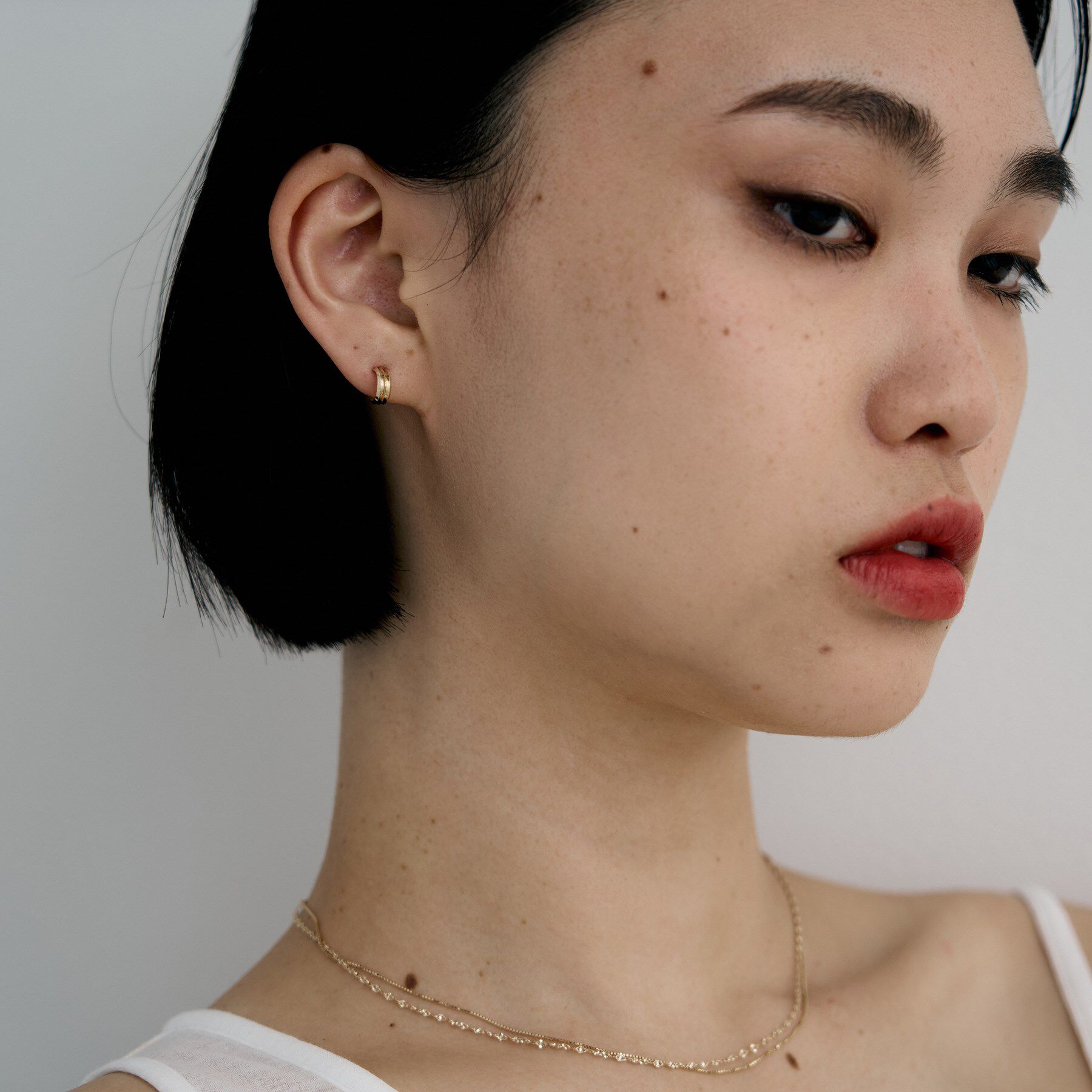 COCOSHNIK ONKITSCH「K10トリプルリッジピアス」|ピアス|