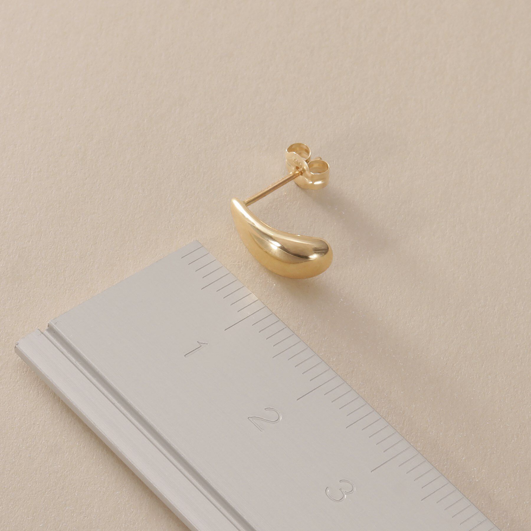 COCOSHNIK「K10中空ペアシェイプカーブ スタッドピアス」|ピアス|