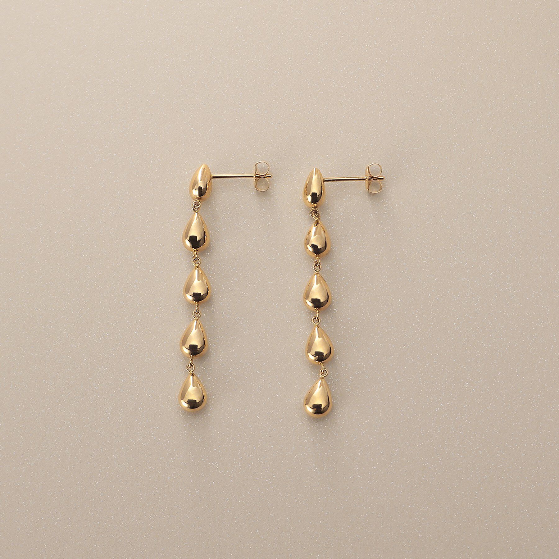 COCOSHNIK「K10中空ペアシェイプ連続 スタッドピアス大」|ピアス|