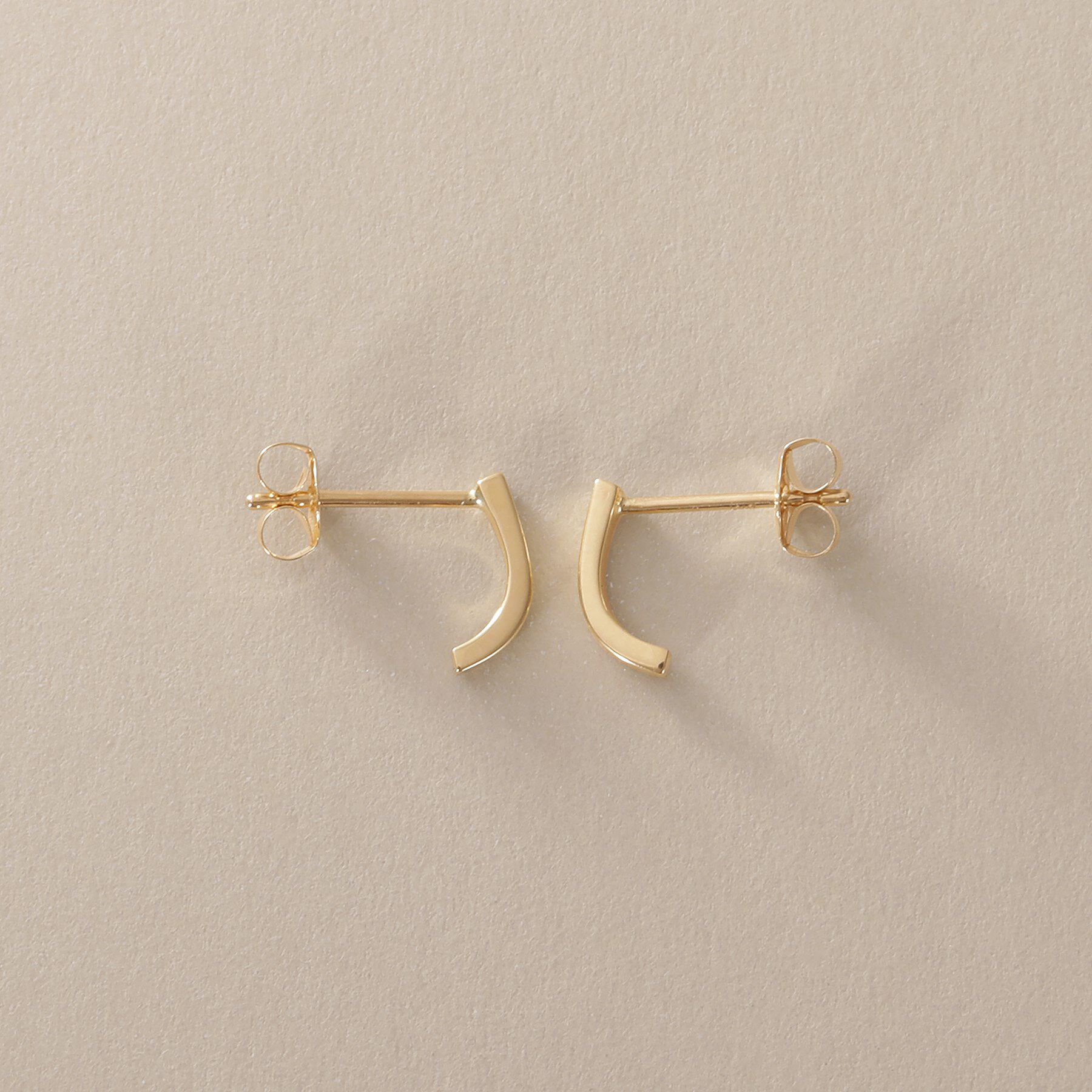 COCOSHNIK「K10カーブライン スタッドピアス」|ピアス|