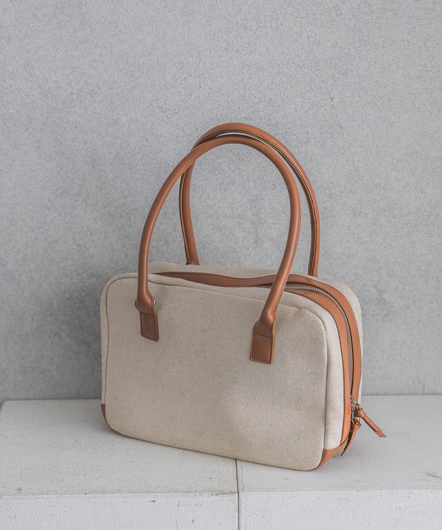 A part by 「バイカラーキャンバスボストン」|ボストンバッグ|ブラウン