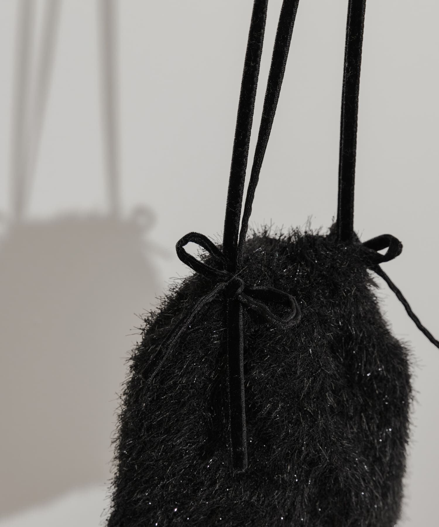 SMELLY「フリンジリボンキンチャクバッグ」|ショルダー・メッセンジャー|