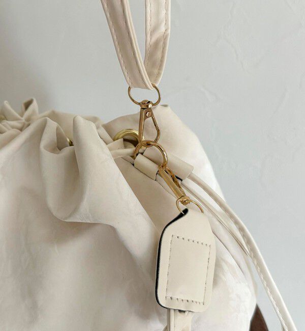 fredy emue「三つ編みハンドル巾着バッグ」|ショルダー・メッセンジャー|