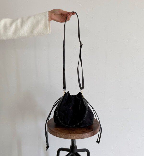 fredy emue「三つ編みハンドル巾着バッグ」|ショルダー・メッセンジャー|