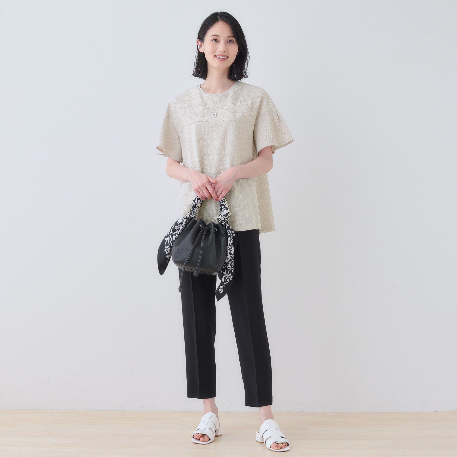 INDIVI「【洗える／体型カバー】凹凸素材フレアデザイントップス」|Tシャツ・カットソー|