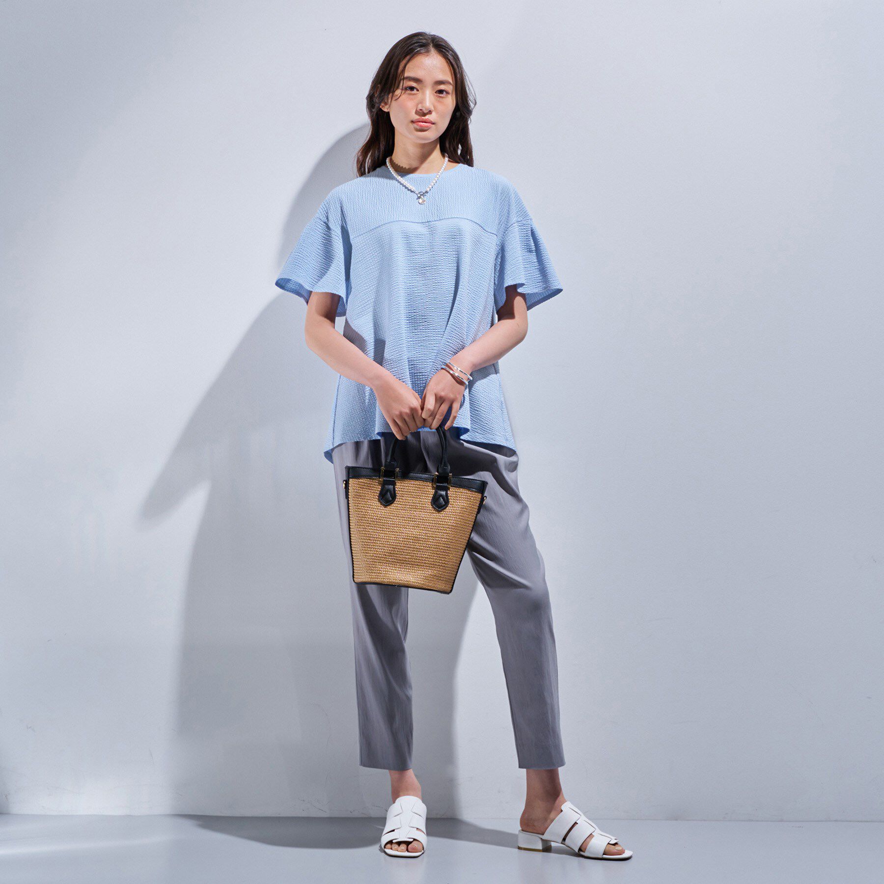 INDIVI「【洗える／体型カバー】凹凸素材フレアデザイントップス」|Tシャツ・カットソー|