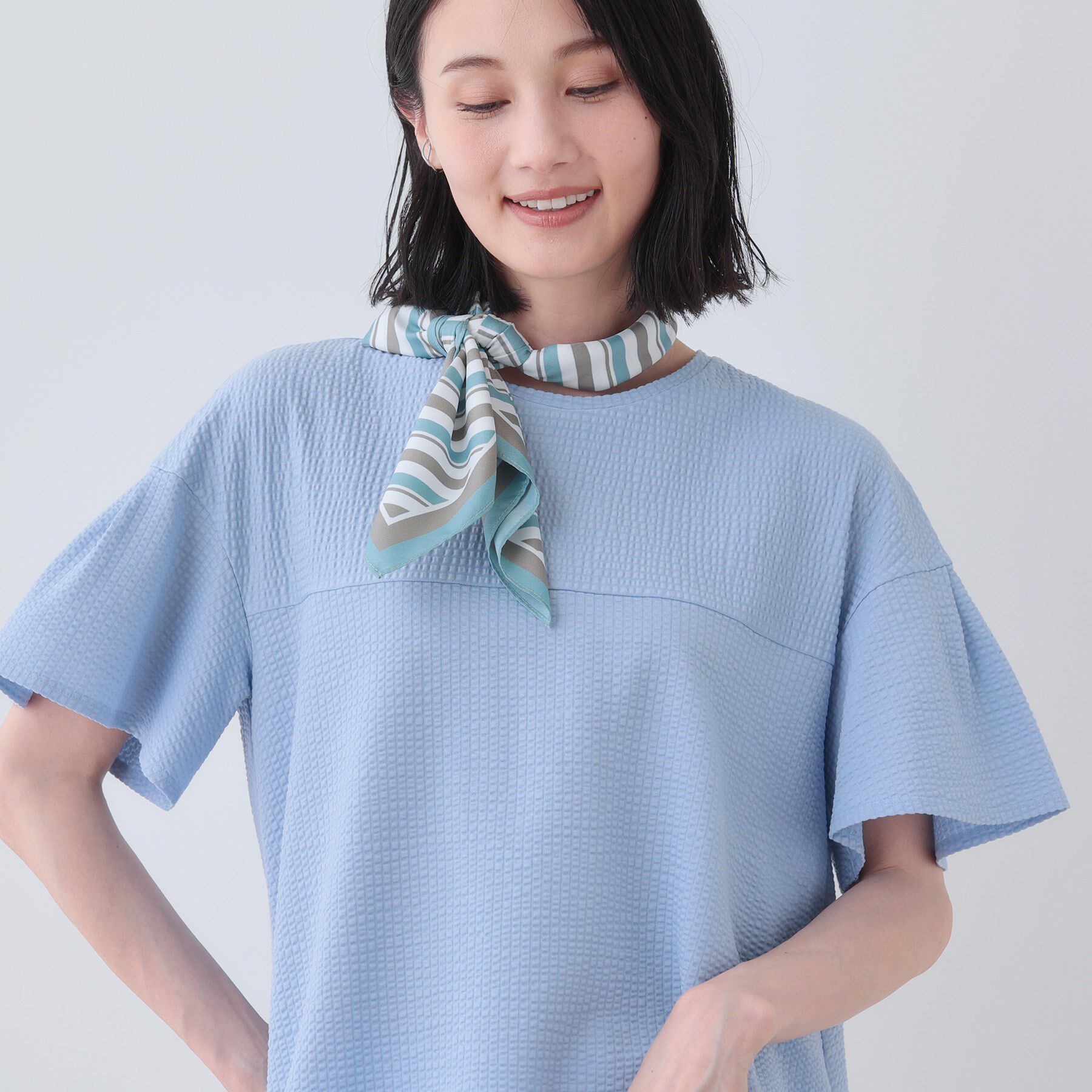 INDIVI「【洗える／体型カバー】凹凸素材フレアデザイントップス」|Tシャツ・カットソー|